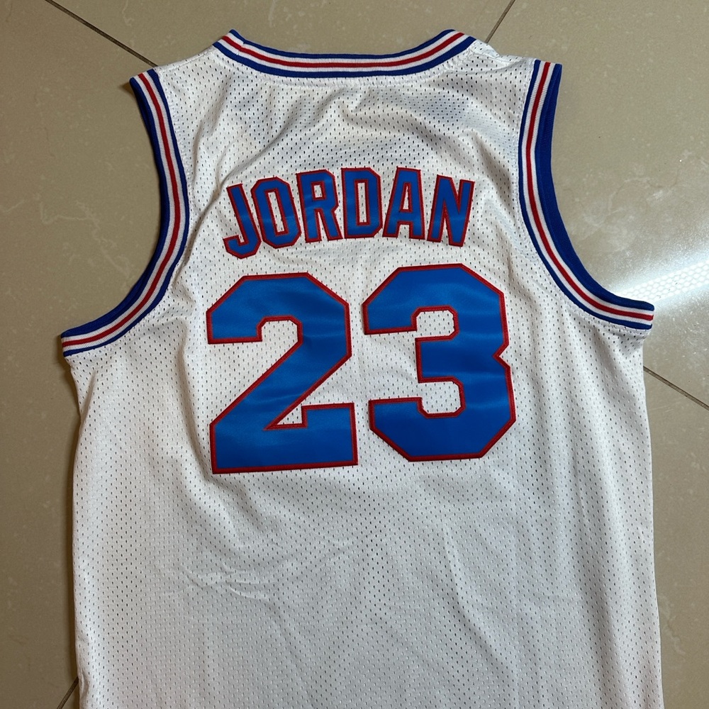 Jordan White and Blue Basketball Jersey
